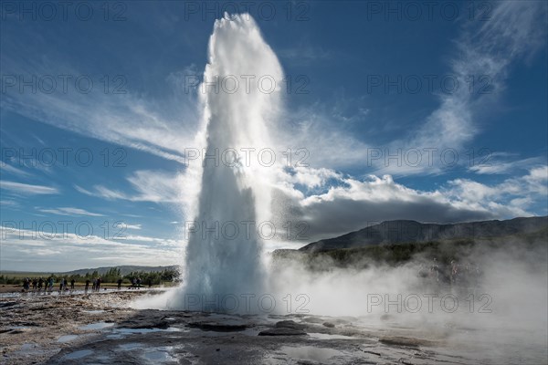 Tourists watching eruption