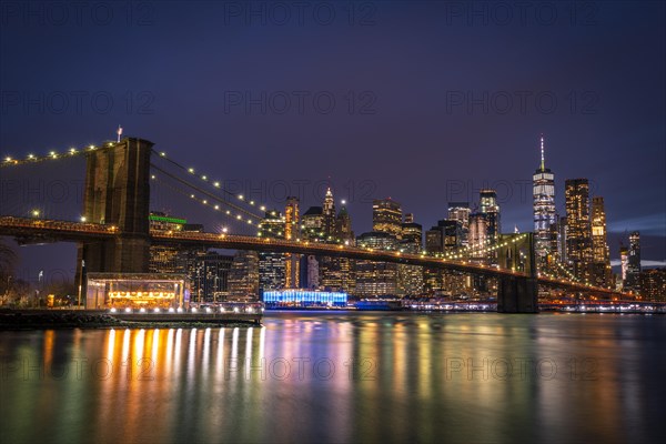 View from Main Street Park at night over the East River to the skyline of lower Manhattan