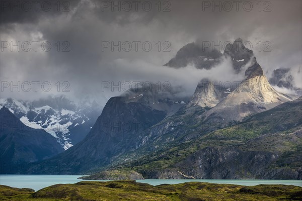 View over Lake Nordenskjoeld to the mountain range Cuernos del Paine in clouds