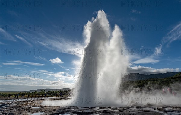 Tourists watching eruption