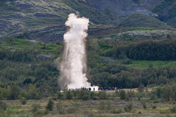 Tourists watching eruption