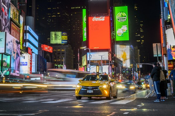 Typical yellow taxi in traffic