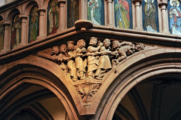 Stone relief of the Damned on the rood screen