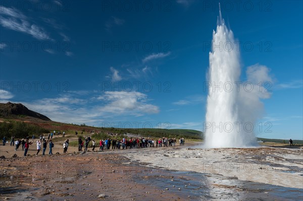 Tourists watching eruption
