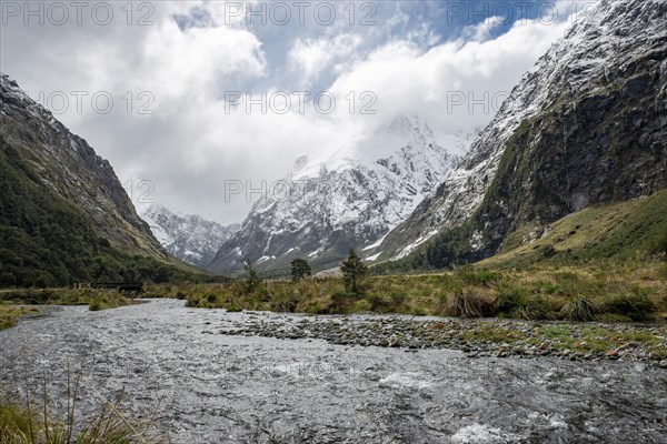 Valley with snow-capped mountains