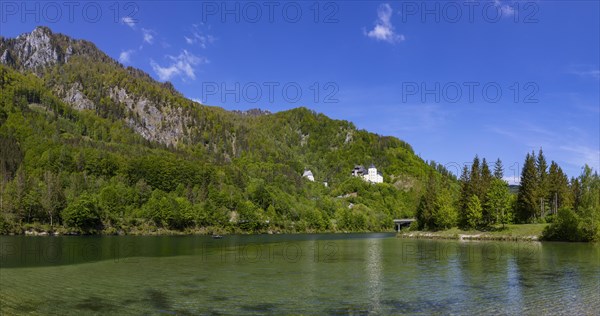 Castle Klaus with mountain church at the Klaus reservoir