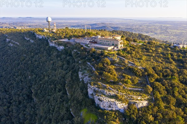 Monastery Santuari de Nostra Senyora de Cura and antenna installations on the mountain Puig de Randa