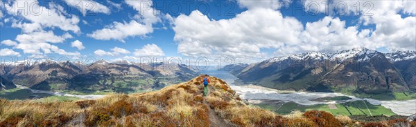 Hiker on the summit of Mount Alfred