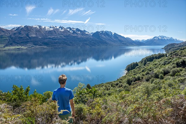 Young man looking over Lake Wakatipu