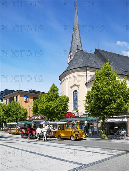 Fiaker and slow train in the pedestrian zone