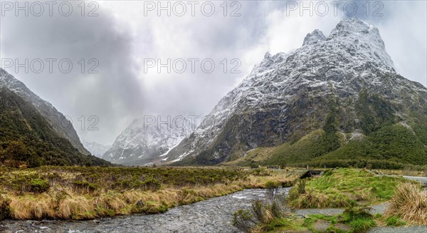 Valley with snow-capped mountains