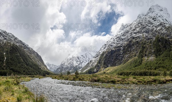 Valley with snow-capped mountains