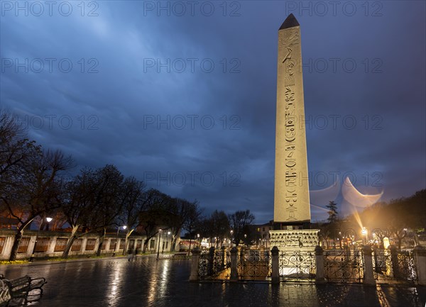 Illuminated Egyptian obelisk on the Hippodrome in the evening