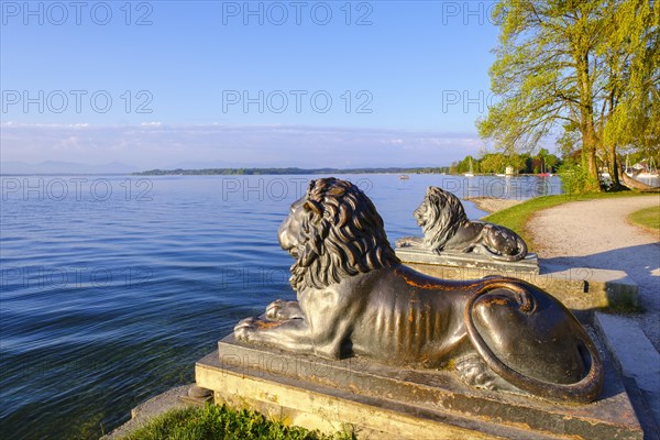 Cast-iron lion figures in front of Midgardhaus at Starnberger See