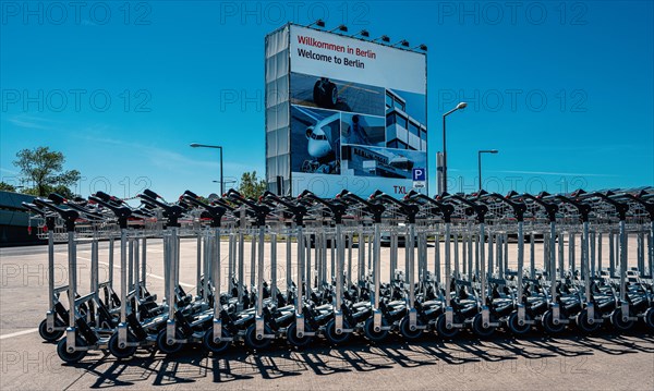 Series of baggage carts at the closed TXL airport in Berlin