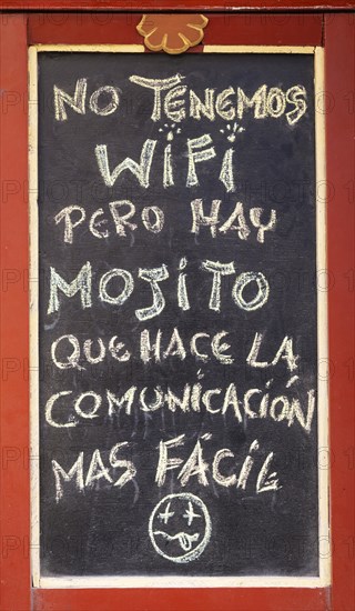 Signboard at a bar in Havana Vieja