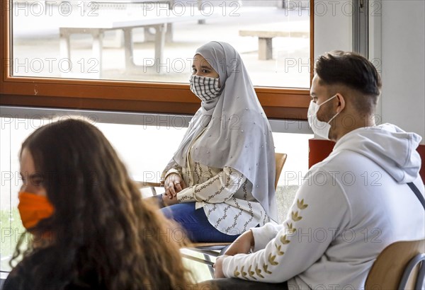 Pupils wear masks during lessons in the music room