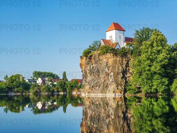 Kirchberg with mountain church above the quarry lake