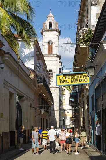 The Bodeguita del Medio and the bell tower of the cathedral behind