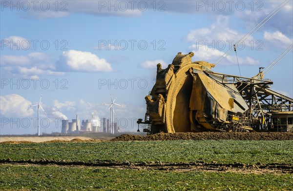 Bucket-wheel excavator wheel excavator in the RWE opencast lignite mine Garzweiler excavates at the demolition edge near Keyenberg