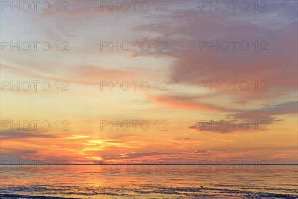 Sunset at the Wadden Sea at low tide