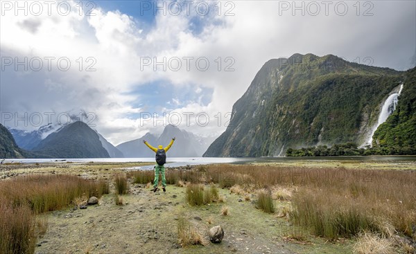 Young man jumps in the air