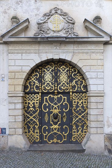 Old decorated wrought-iron gate at the meat market