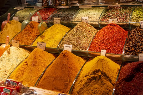 Different spices at a market stand