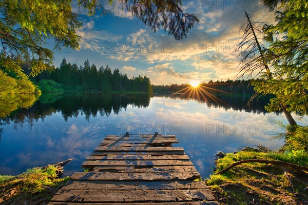 Moor lake Etang de la Gruere at sunset