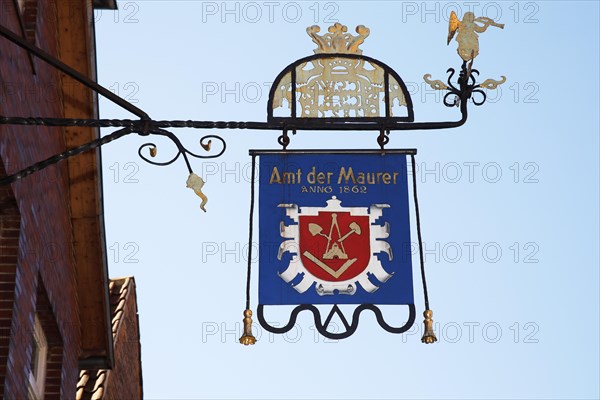 Craftsman's sign Amt der Maurer Anno 1862 on a building in the old town