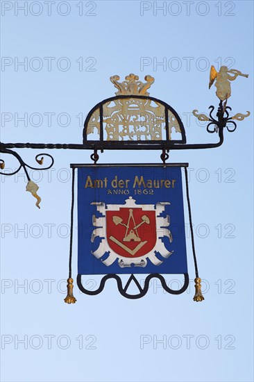 Craftsman's sign Amt der Maurer Anno 1862 on a building in the old town