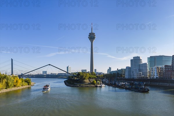 City panorama at the Media Harbour with Gehry buildings at the new Zollhof and Rhine Tower