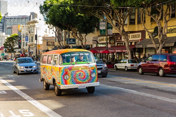 Painted VW bus in road traffic