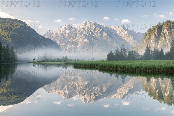 Alpine lake with reflection