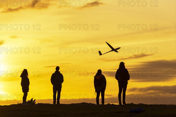 People with model airplane on the Breitenstein