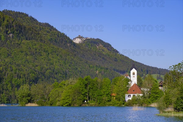 Weissensee with church St. Walburga in the village Weissensee