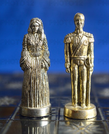 Chess pieces on a play board