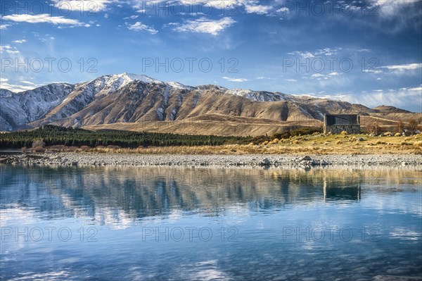 Church of the good Shepard reflected in Lake Tekapo