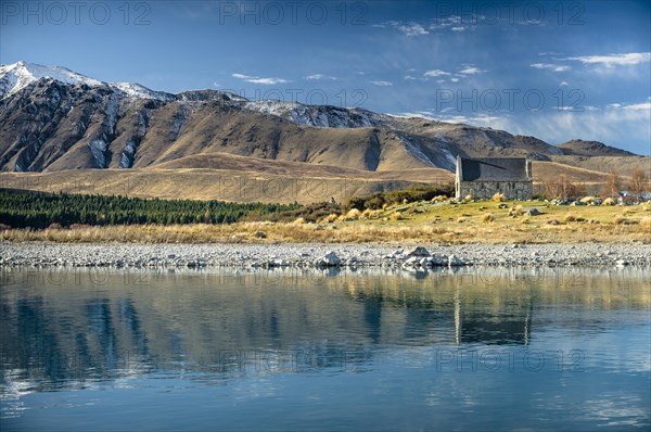 Church of the good Shepard reflected in Lake Tekapo