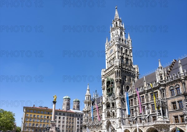 New town hall with Marian column and steeples of the Church of Our Lady