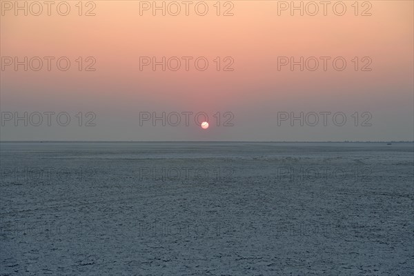 Wide plain of the Makgadikgadi salt pans at sunset