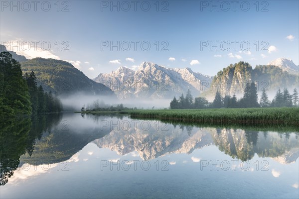 Alpine lake with reflection