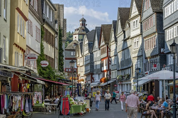Shopping street with historic half-timbered houses