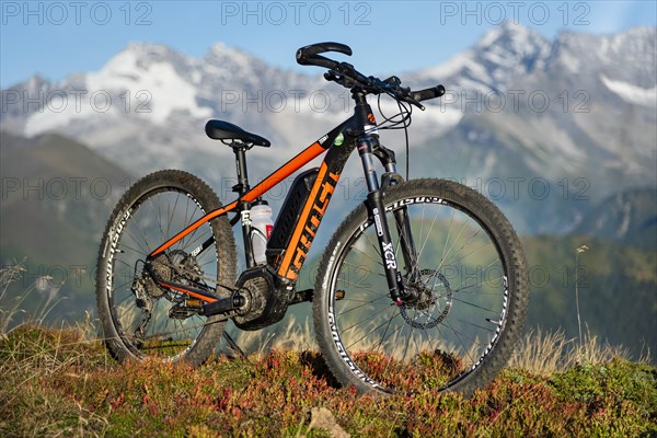 EMTB in autumnal coloured mountain landscape of the Stubaier Alps