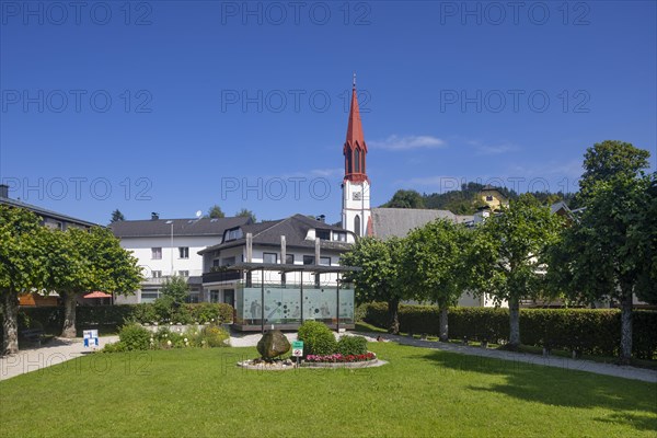 Lake promenade with pile-dwelling village pavilion and protestant church