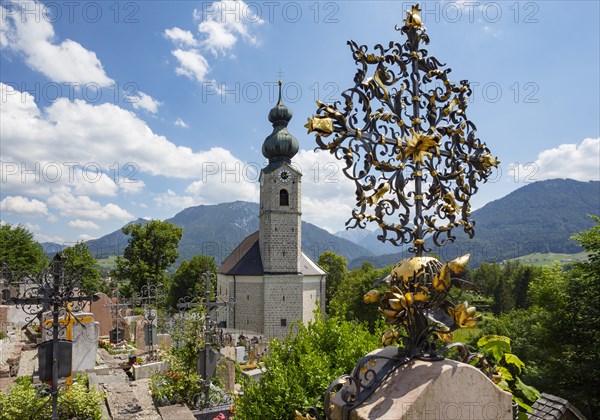 Wrought iron cross in cemetery