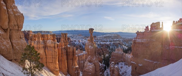 Rock formation Thors Hammer at sunrise with sun star