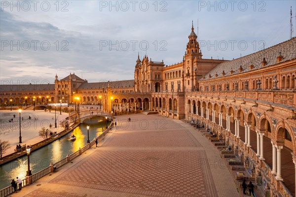 View over the illuminated Plaza de Espana at dusk Panorama