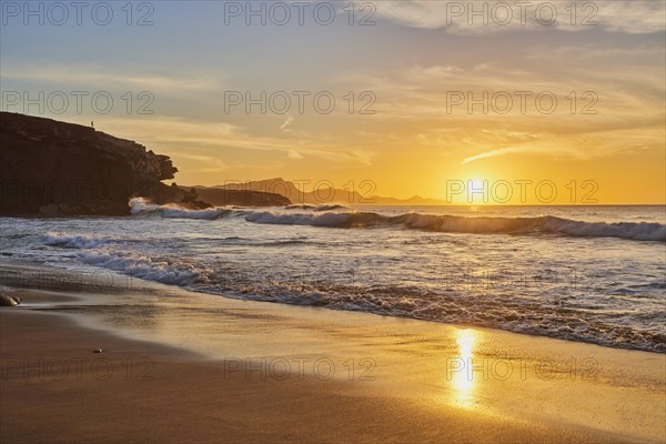 Beach Playa de la Pared at sunset