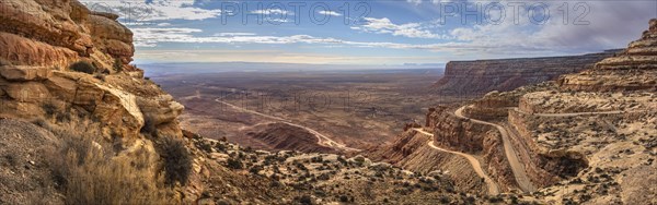 Moki Dugway leads in serpentines through the steep face of the Cedar Mesa